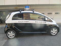 Photo: Blue Rotating Light Security Patrol Car (Side View)