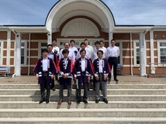 Group photo from the inspection of Koyo Soccer Field