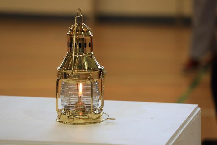 Photo: The flame of the sacred fire lit by lanterns