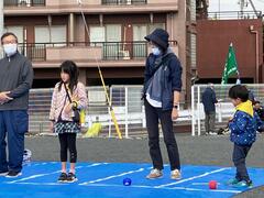 Image Parent and child enjoying boccia